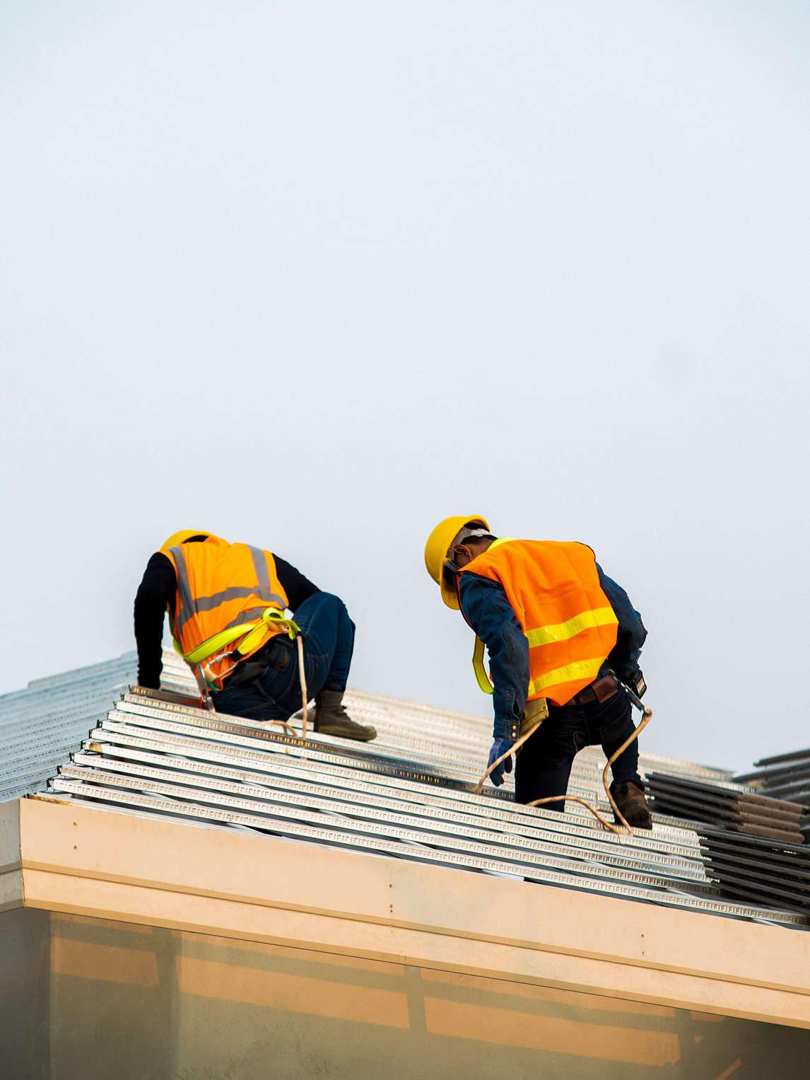man working on a roof