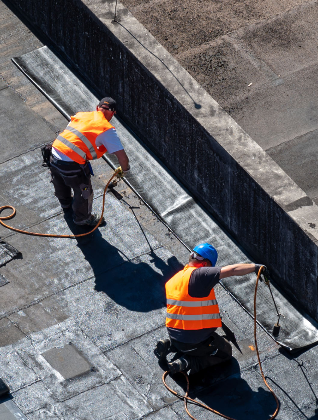 man working on a roof